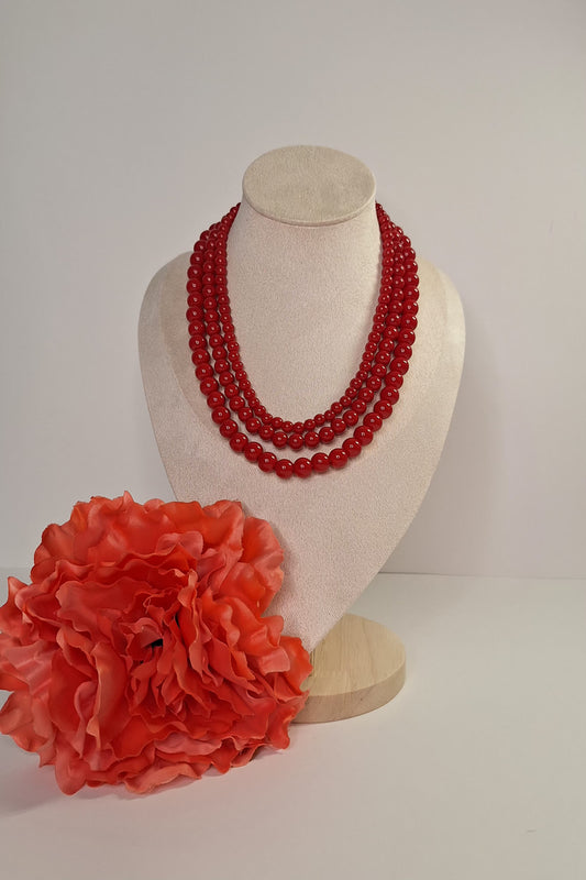 Collar triple vuelta