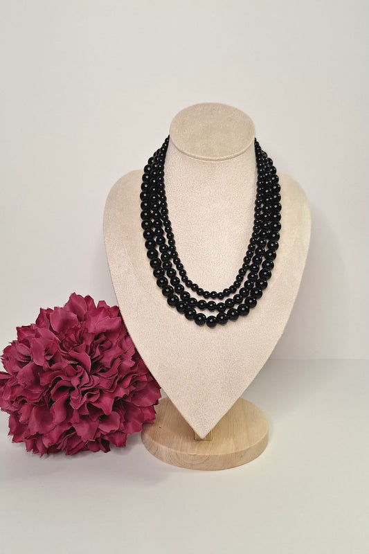 Collar triple vuelta